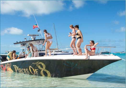 Private charter boat in the Bahamas with a group of girls enjoying the ride